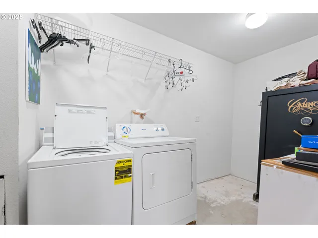 a view of a dining area with furniture and chandelier