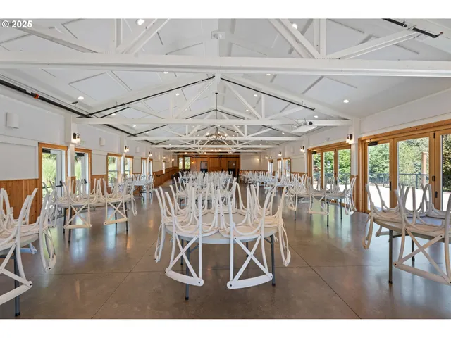 a view of building with cars parked