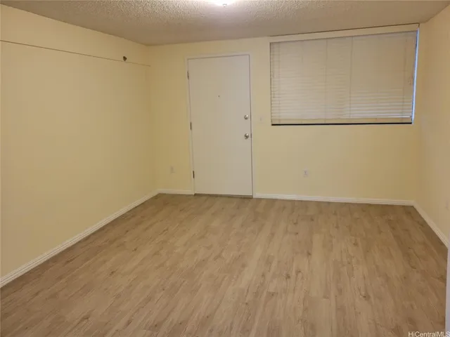 a bathroom with a sink vanity mirror and toilet