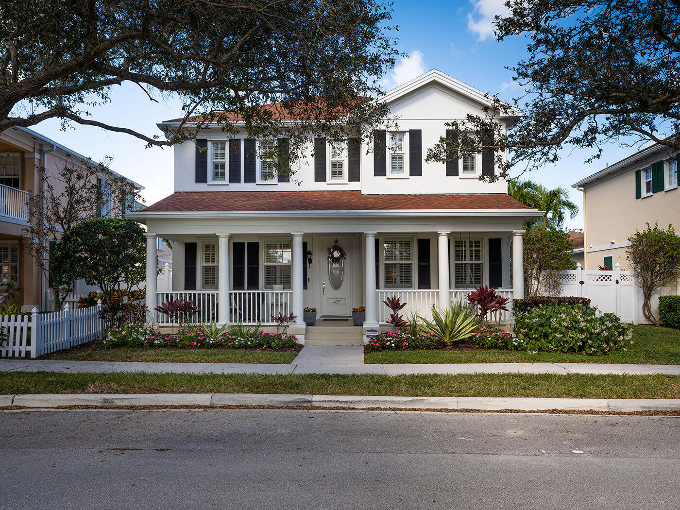 127 Danforth Drive Jupiter, FL 33458 - Photo 1 of 44 front view of a house with a yard