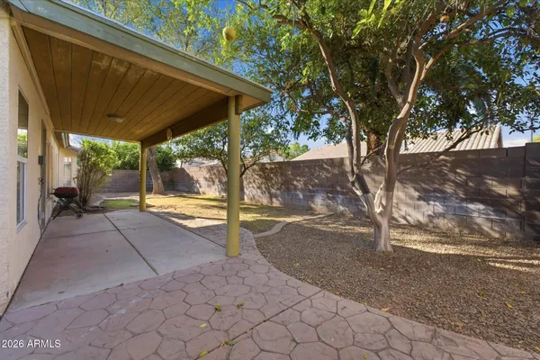 a very nice looking house with a yard