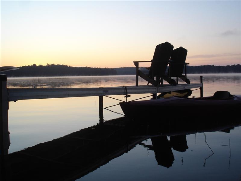 290 Hoffman Shr Road Palermo, ME 04354 - Photo 21 of 28 Other. Dock reflection