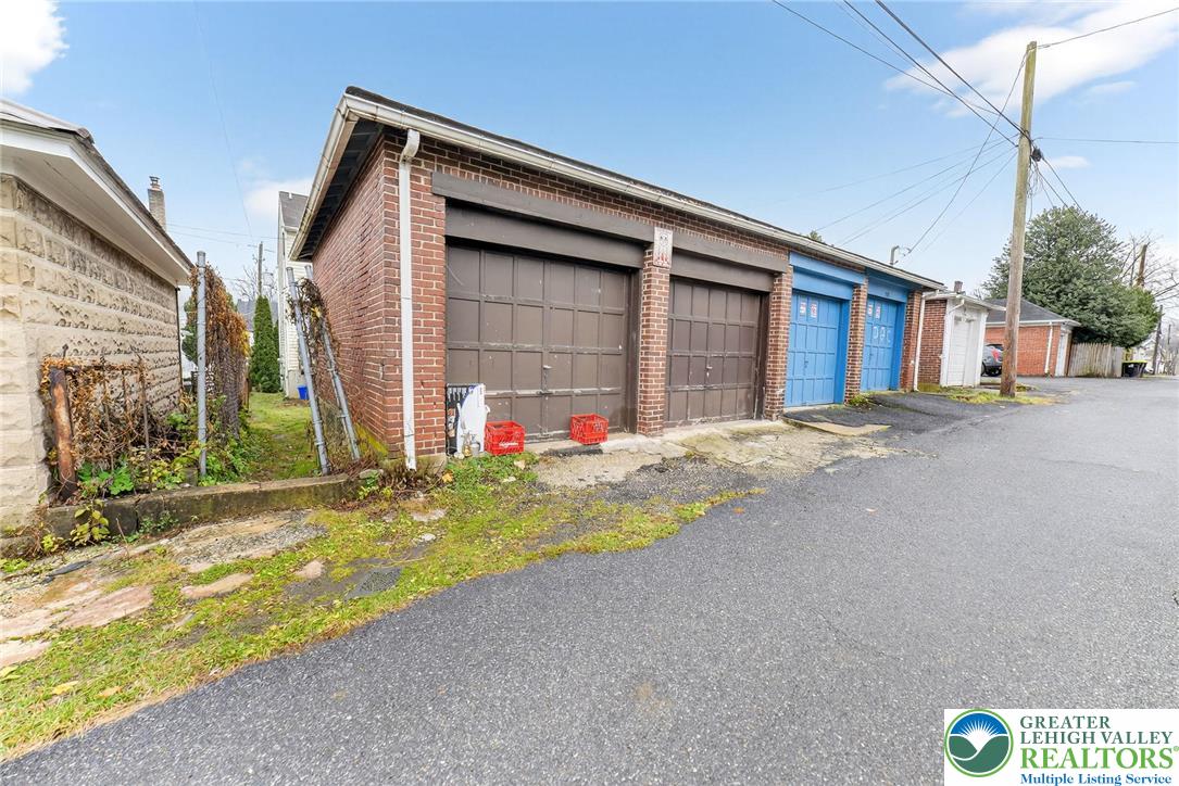 708 Cherokee Street Bethlehem, PA 18015 - Photo 17 of 18 a view of the house with backyard and garden