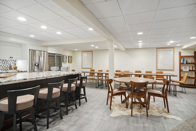 a view of a dining area with furniture window and wooden floor