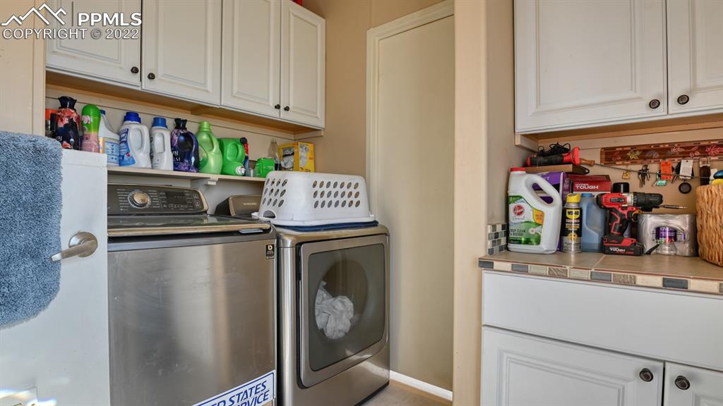 34475 East Jones Road Yoder, CO 80864 - Photo 22 of 37 a utility room with dryer and washer