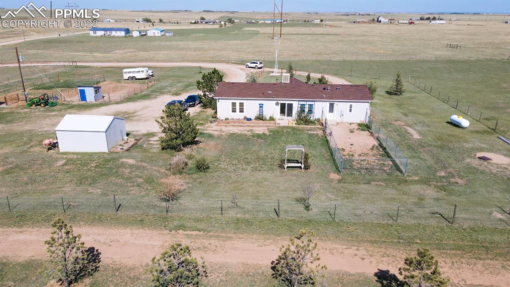 34475 East Jones Road Yoder, CO 80864 - Photo 24 of 37 a aerial view of a house with a ocean view