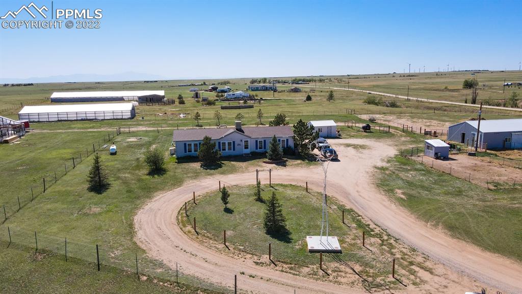 34475 East Jones Road Yoder, CO 80864 - Photo 37 of 37 a view of a swimming pool with a lake view