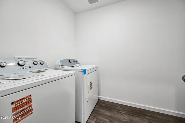 a utility room with dryer and washer