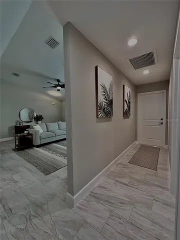 a view of a livingroom with wooden floor