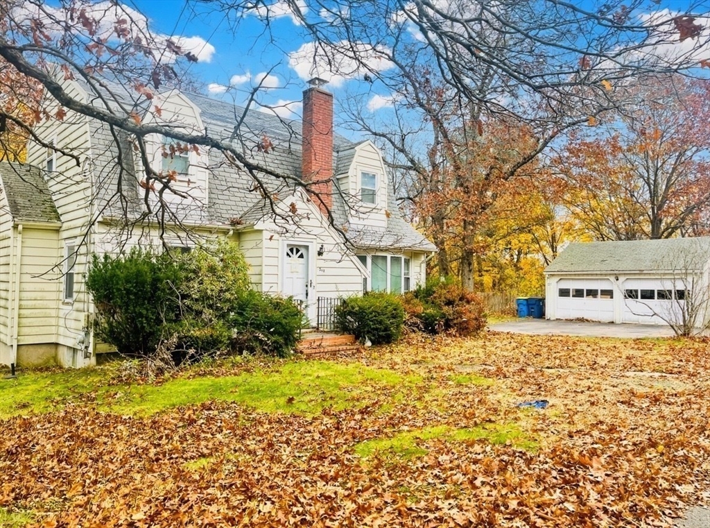 314 South Street Randolph, MA 02368 - Photo 2 of 8 a view of a yard with a house
