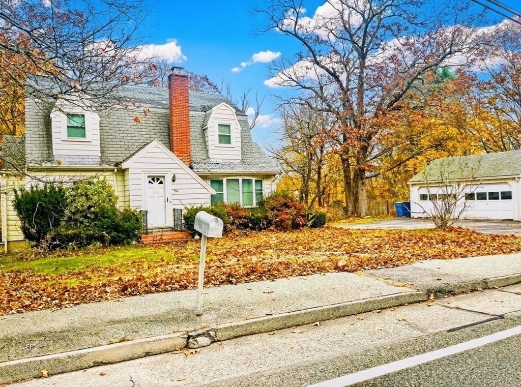 314 South Street Randolph, MA 02368 - Photo 7 of 8 a front view of a house with a yard