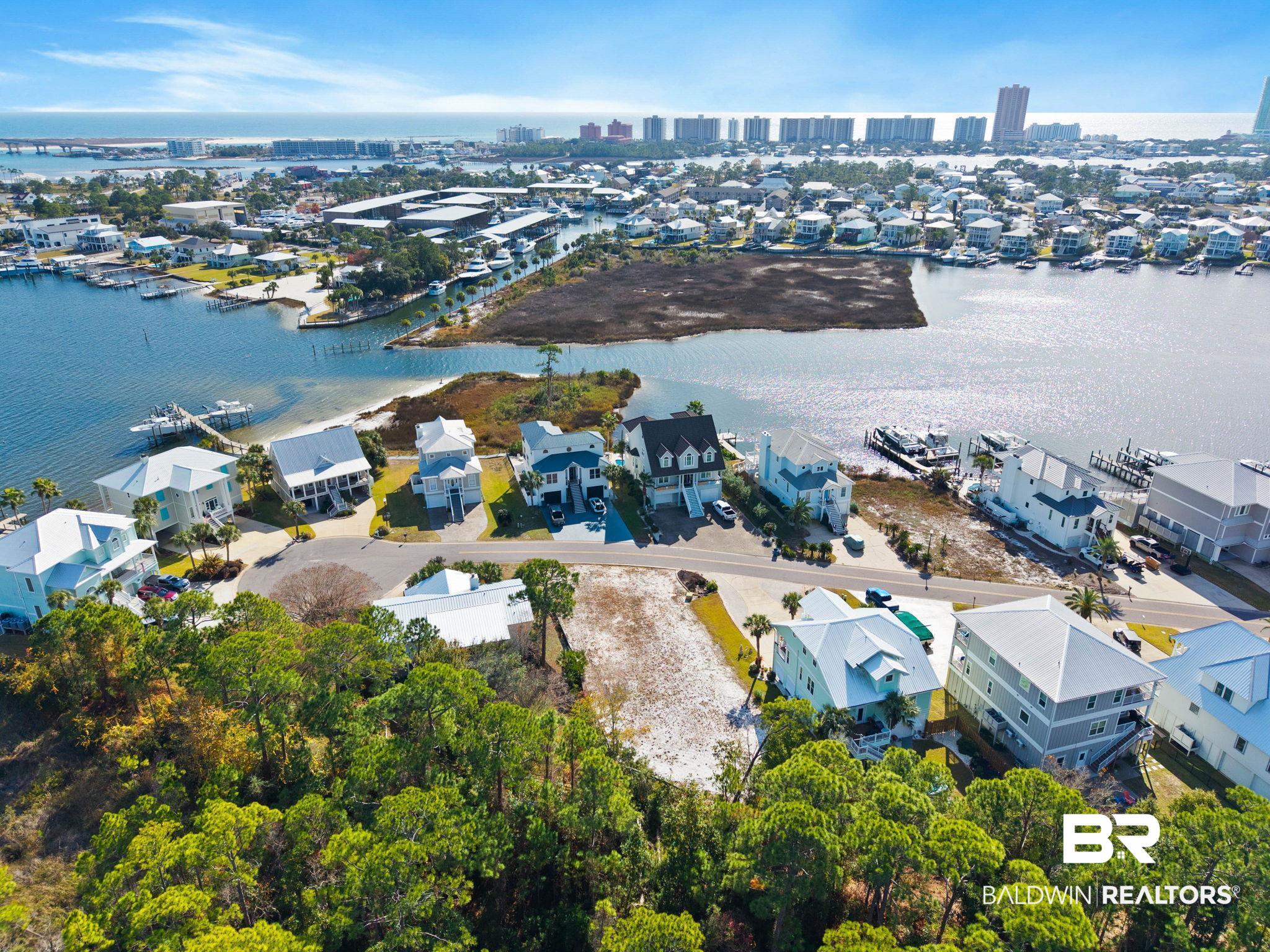 4143 Harbor Road Orange Beach, AL 36561 - Photo 19 of 33 View of urban area featuring a large body of water and nearby suburban area