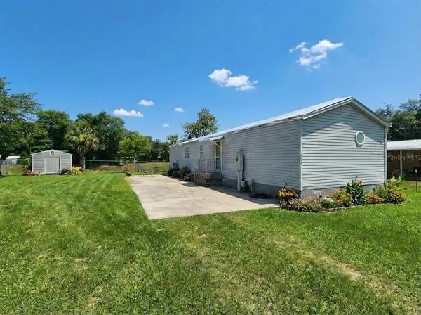 a front view of house with garden