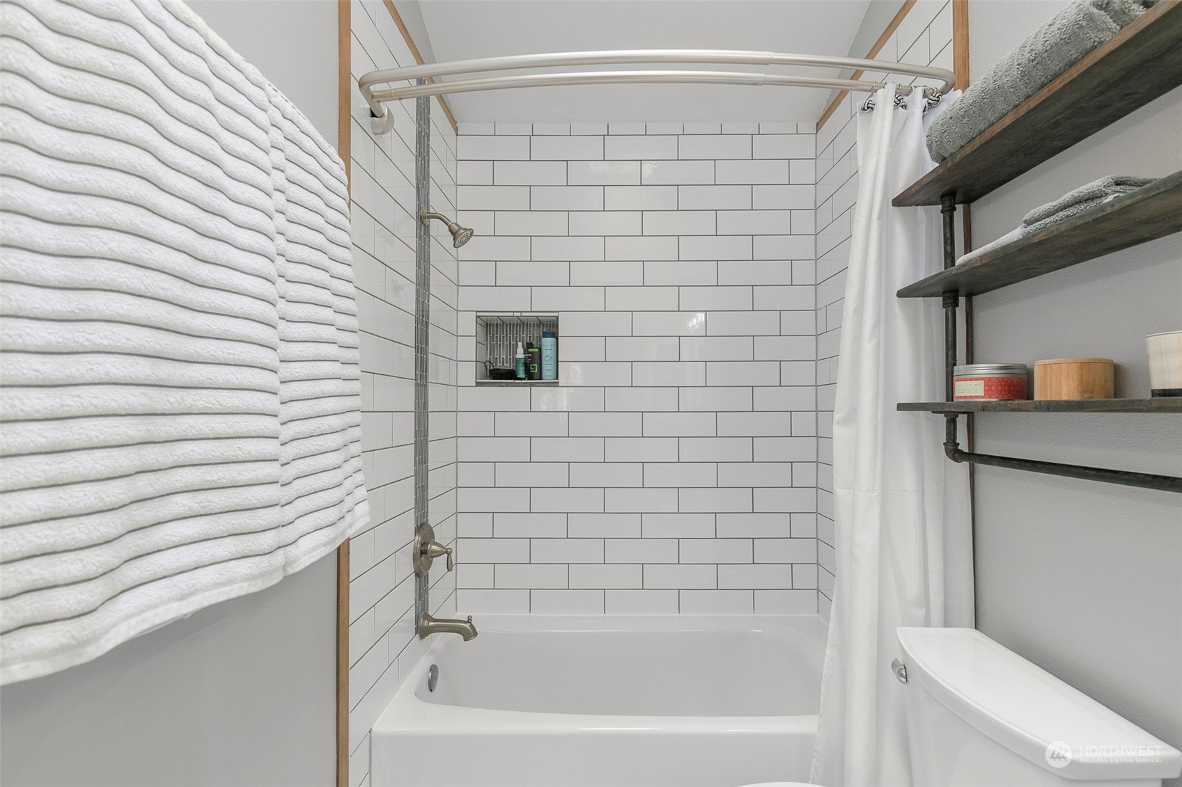 1522 196th Street Southeast, Unit G101 Bothell, WA 98012 - Photo 22 of 29 a bathroom with a shower and a sink