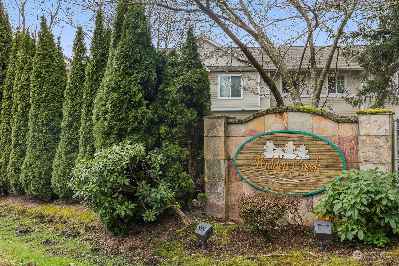 1522 196th Street Southeast, Unit G101 Bothell, WA 98012 - Photo 28 of 29 an aerial view of a house with garden space sitting space and swimming pool