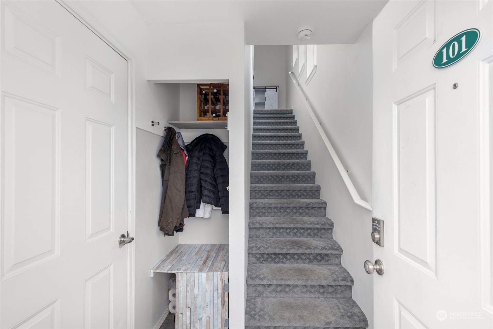 1522 196th Street Southeast, Unit G101 Bothell, WA 98012 - Photo 3 of 29 a view of entryway and hall with wooden floor