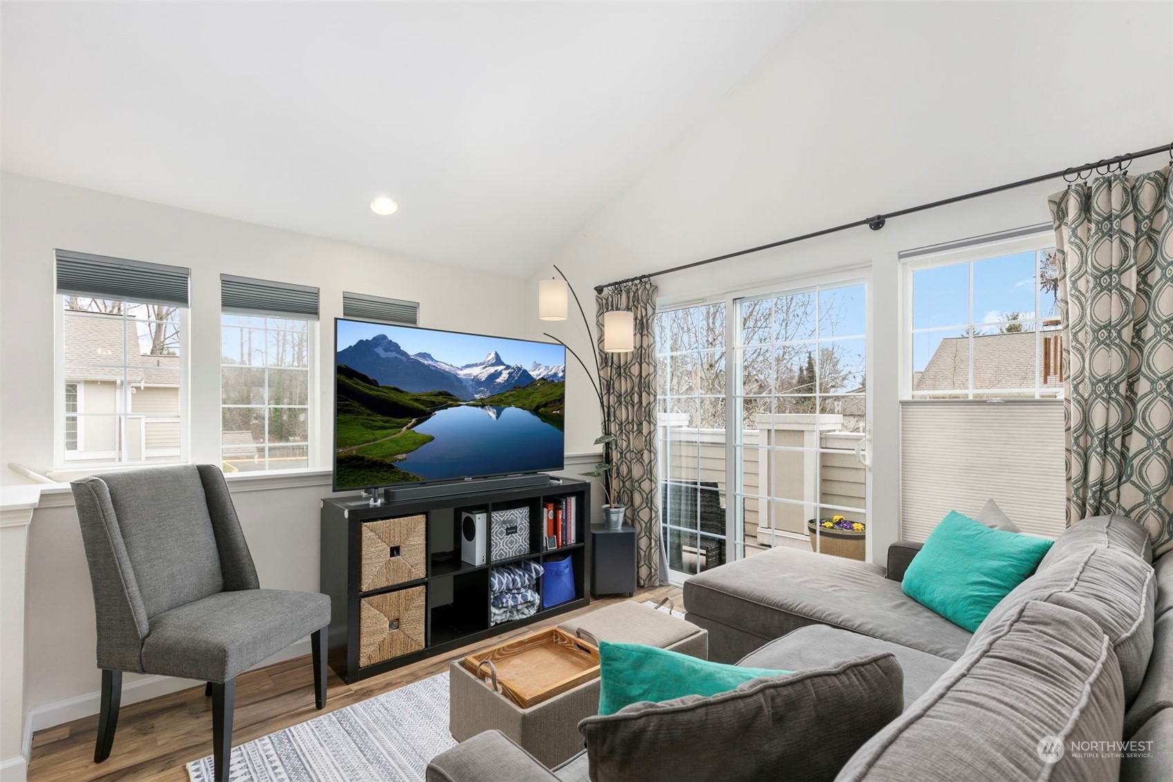 1522 196th Street Southeast, Unit G101 Bothell, WA 98012 - Photo 6 of 29 a living room with furniture and a floor to ceiling window or couch