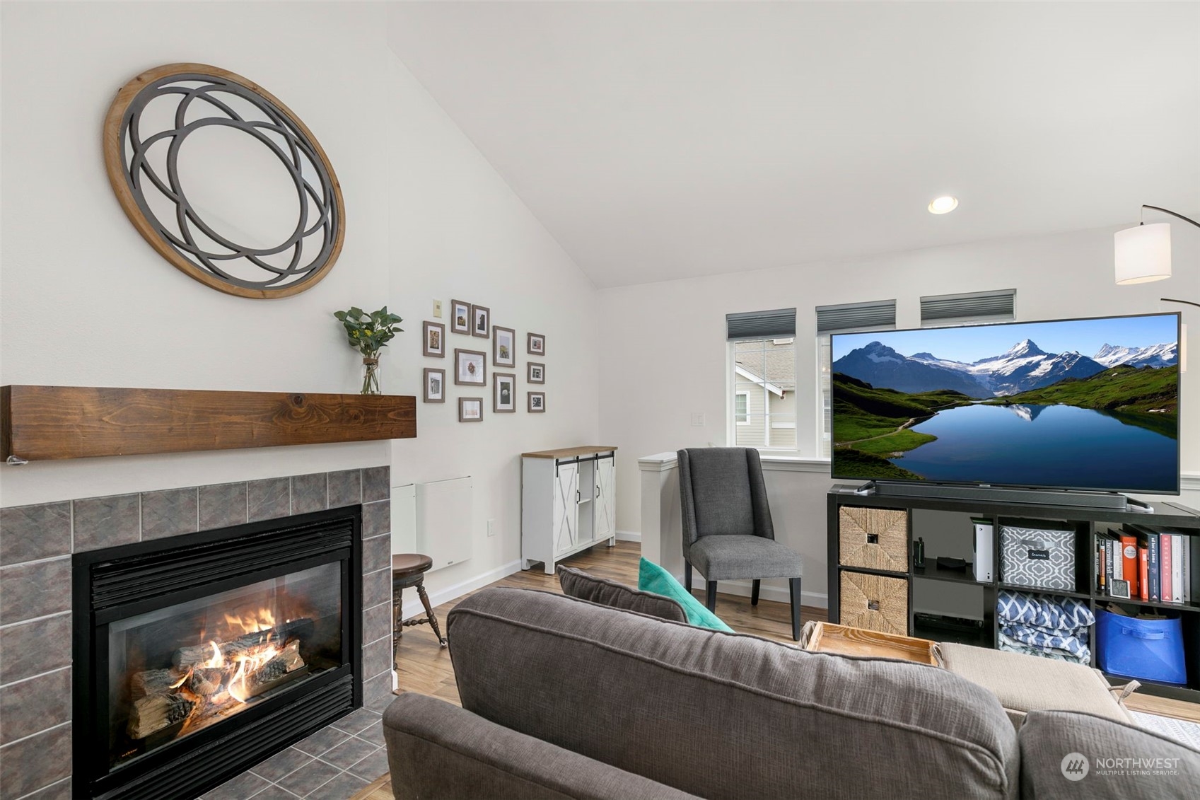 1522 196th Street Southeast, Unit G101 Bothell, WA 98012 - Photo 9 of 29 a living room with furniture and a fireplace