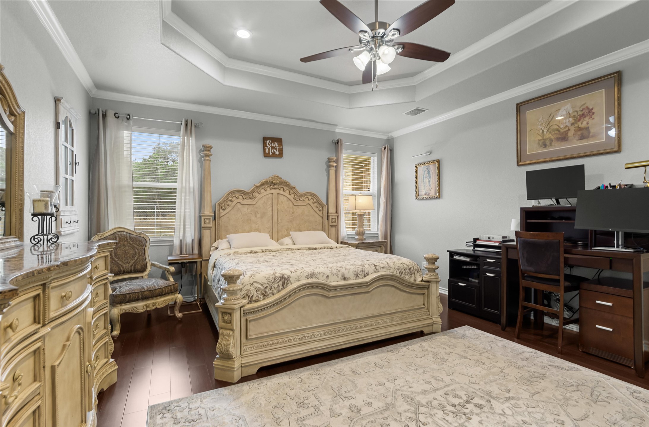 16017 Toby Court Temple, TX 76502 - Photo 13 of 33 Bedroom with a raised ceiling, ornamental molding, a ceiling fan, dark wood finished floors, and a desk