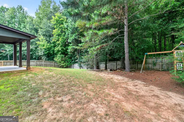 a view of outdoor space with deck and backyard