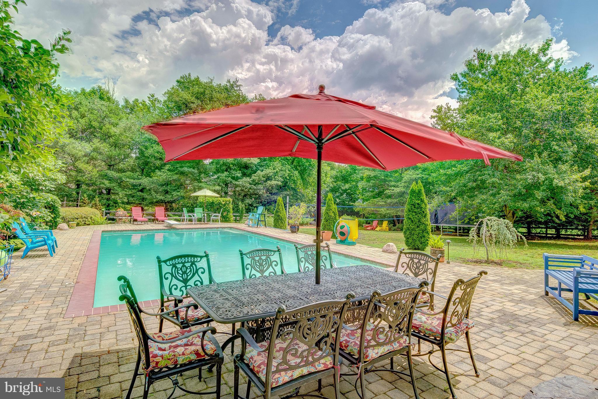 3222 Breckenridge Way Riva, MD 21140 - Photo 12 of 29 an outdoor space with furniture and umbrella