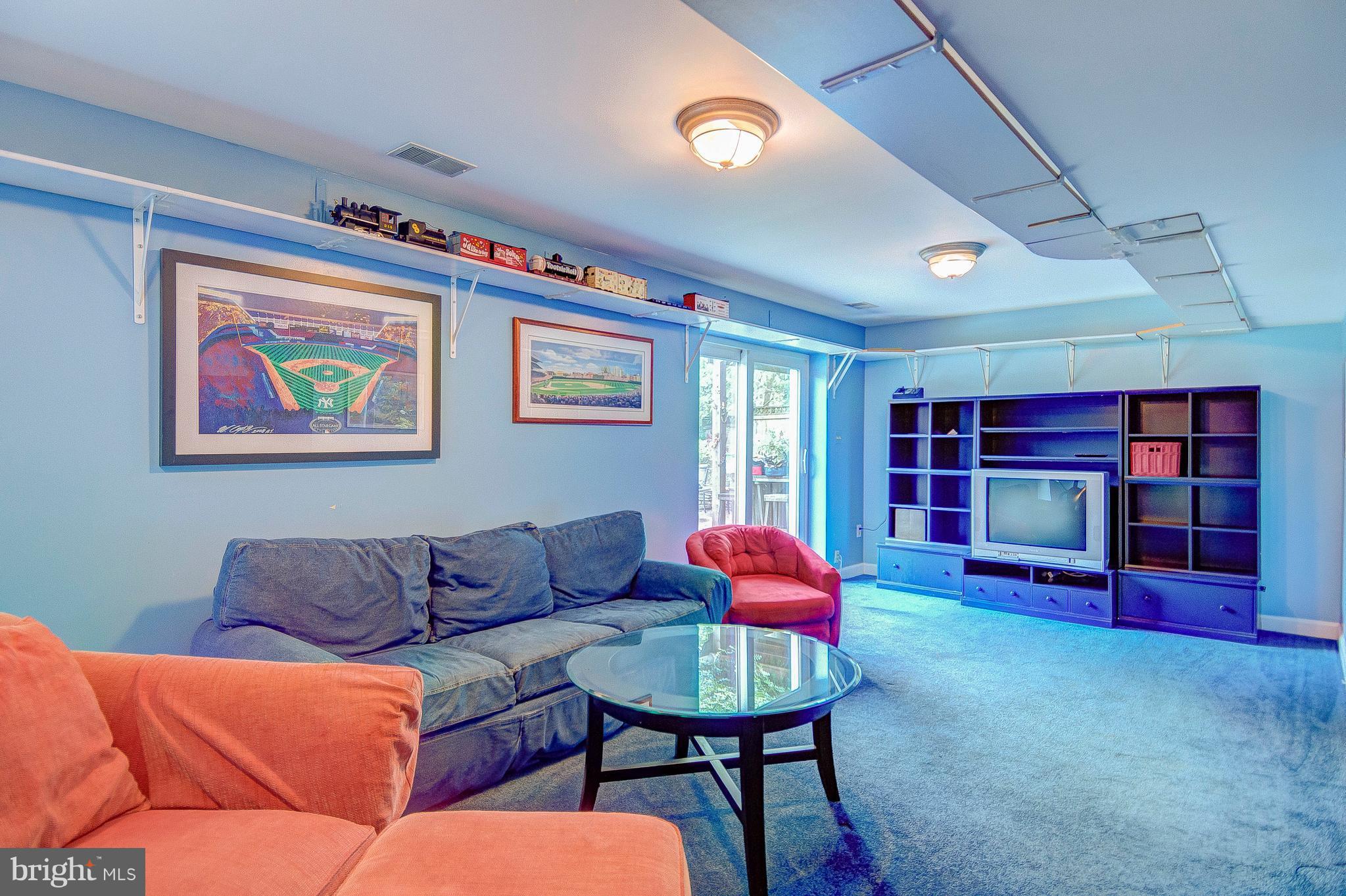 3222 Breckenridge Way Riva, MD 21140 - Photo 20 of 29 a living room with furniture and a flat screen tv