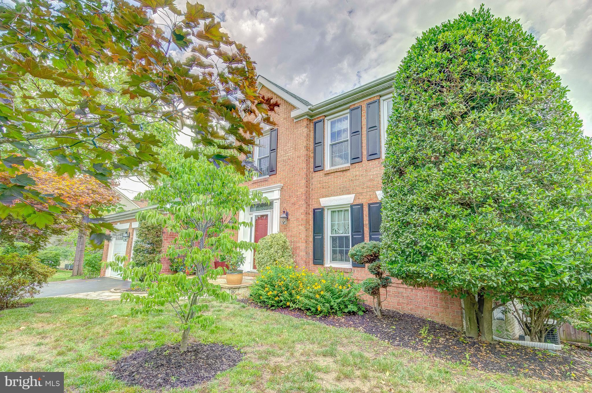 3222 Breckenridge Way Riva, MD 21140 - Photo 4 of 29 a brick building with a yard