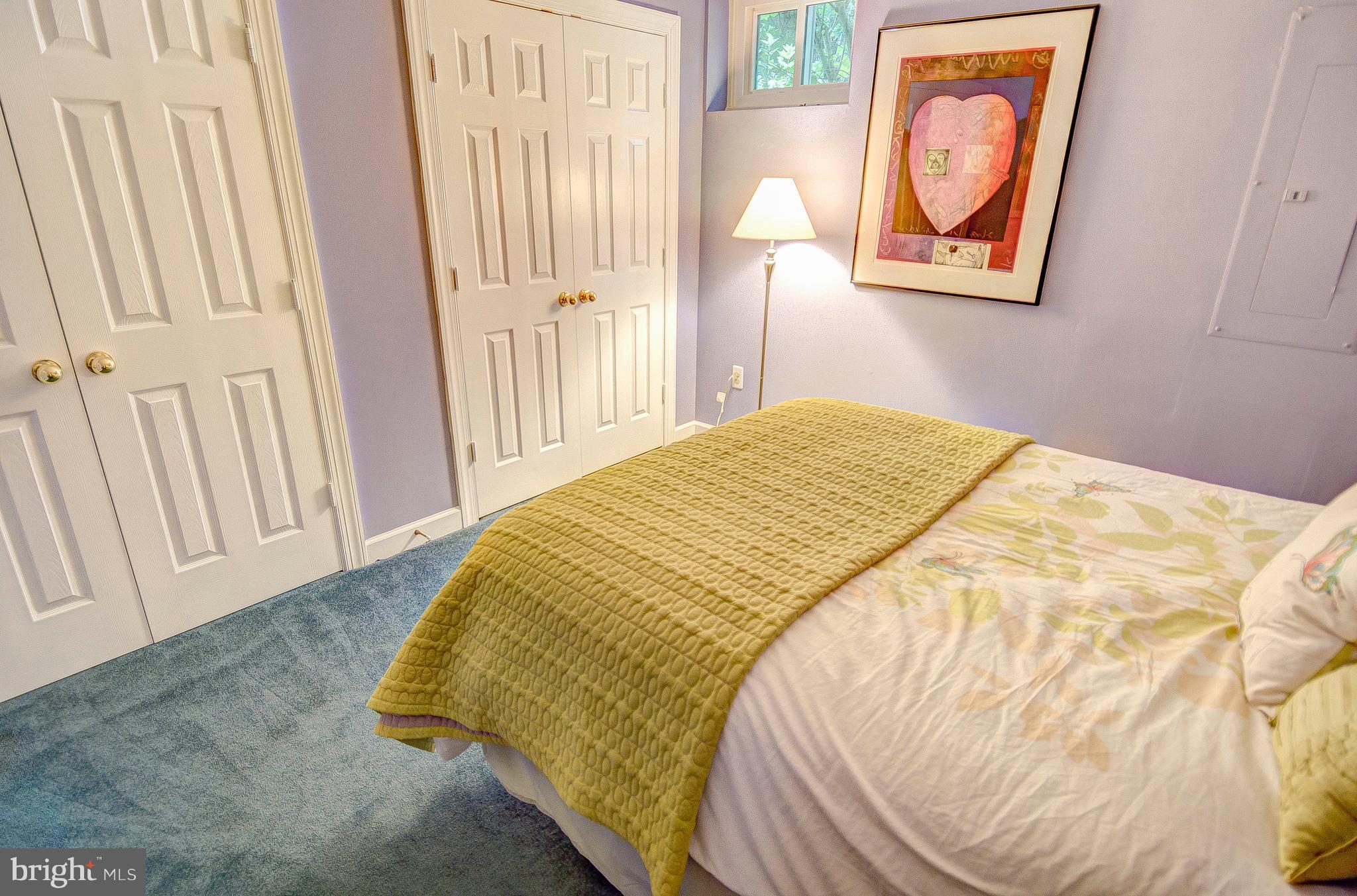 3222 Breckenridge Way Riva, MD 21140 - Photo 8 of 29 a bed sitting in a bedroom next to a window