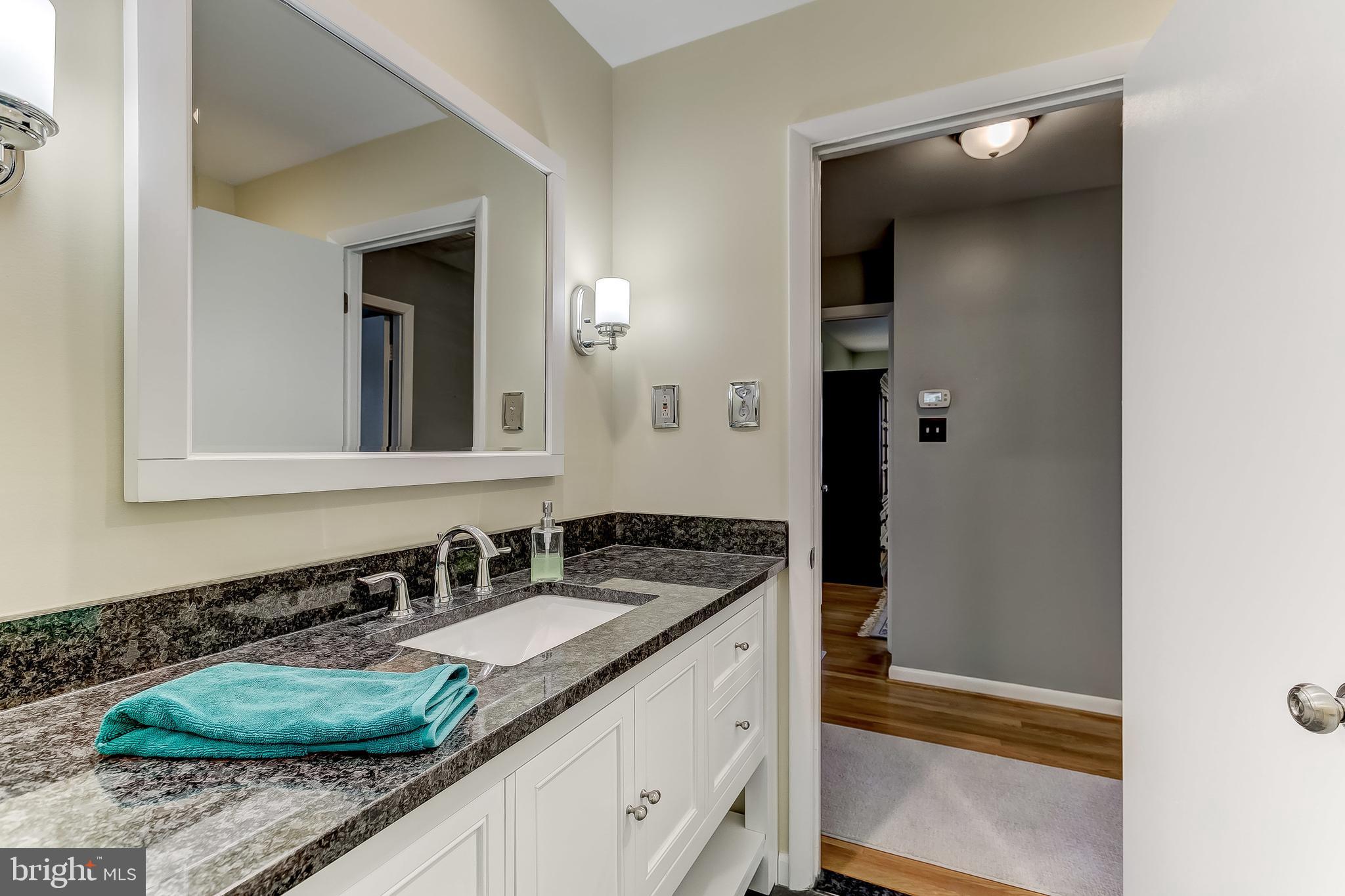 7928 Long Meadow Road Baltimore, MD 21208 - Photo 27 of 34 Beautiful granite tops and large vanity