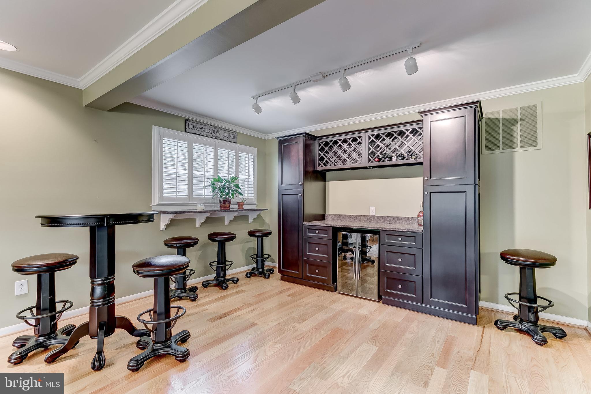 7928 Long Meadow Road Baltimore, MD 21208 - Photo 8 of 34 Versatile entertaining area and beautiful built-in