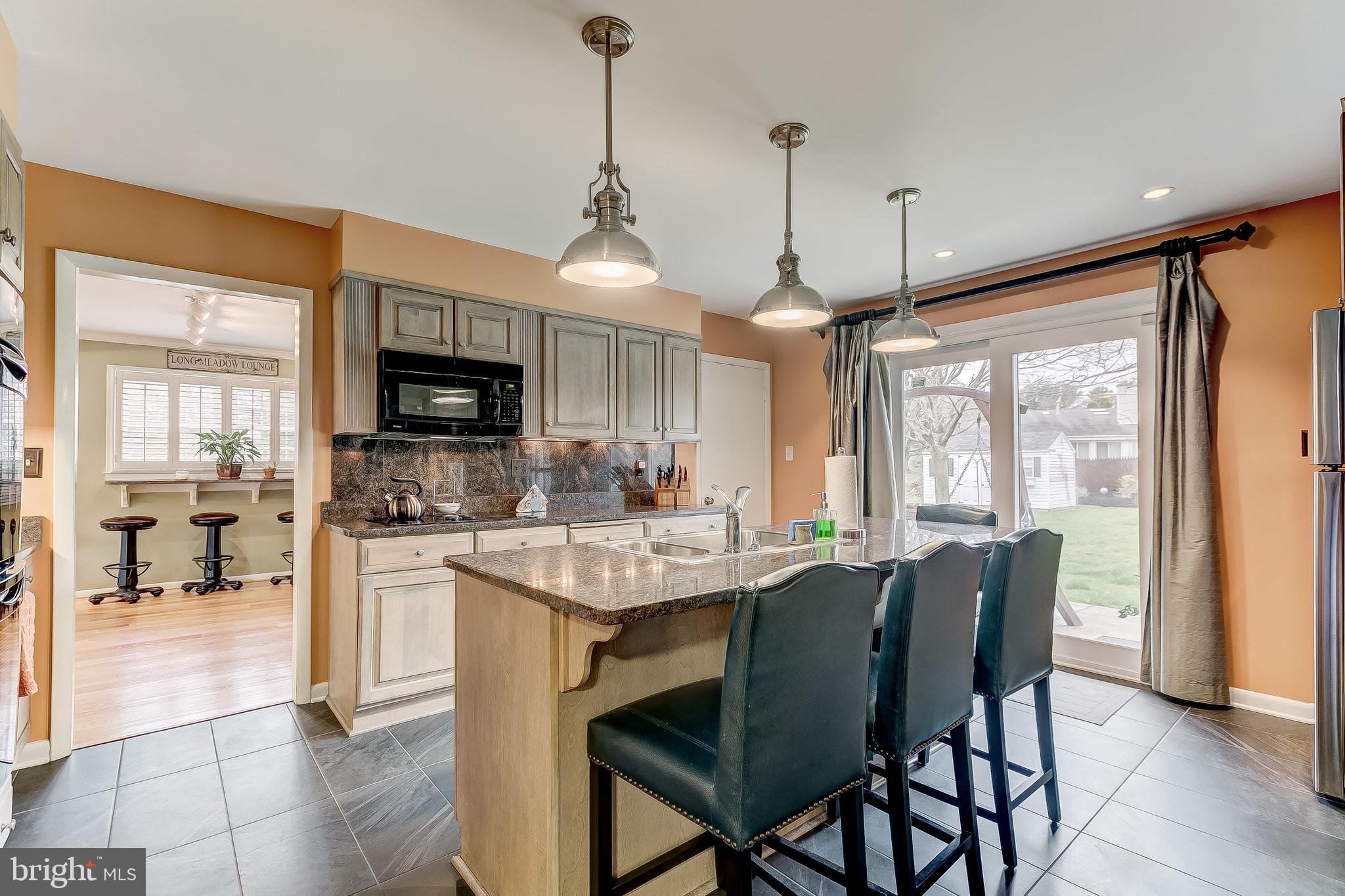 7928 Long Meadow Road Baltimore, MD 21208 - Photo 9 of 34 Wonderfully updated kitchen with large island