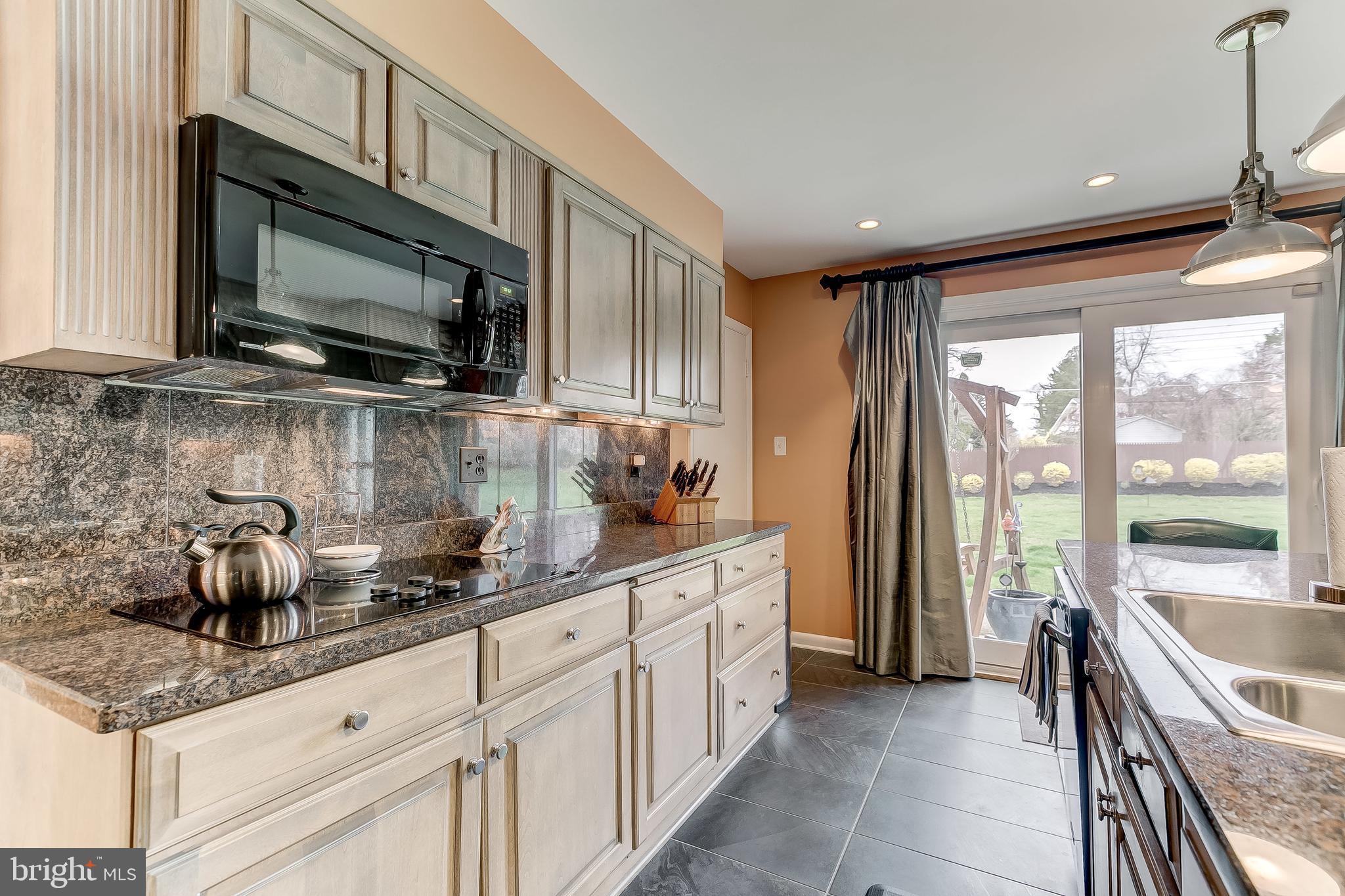 7928 Long Meadow Road Baltimore, MD 21208 - Photo 10 of 34 Great cabinets & granite counters and work areas
