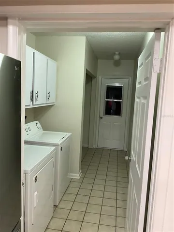 a view of a porch and garden