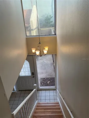 a view of a small space with wooden floor