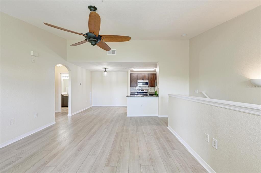 8911 Manor Loop, Unit 207 Lakewood Ranch, FL 34202 - Photo 20 of 71 a view of empty room with wooden floor