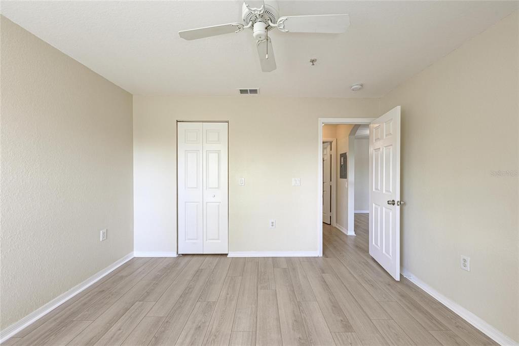 8911 Manor Loop, Unit 207 Lakewood Ranch, FL 34202 - Photo 36 of 71 wooden floor in an empty room