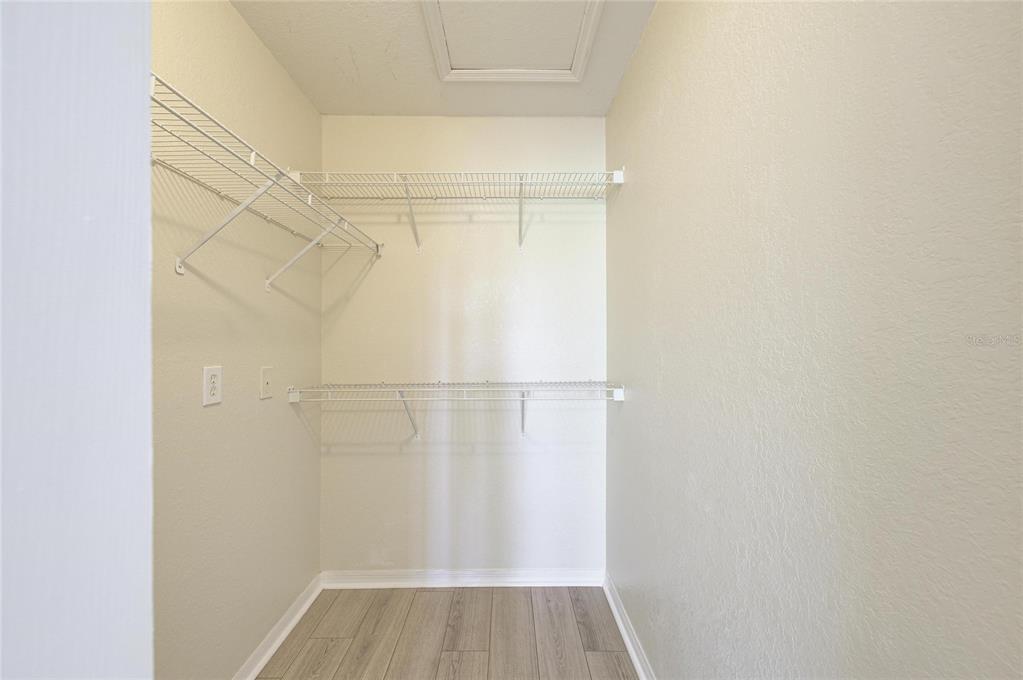 8911 Manor Loop, Unit 207 Lakewood Ranch, FL 34202 - Photo 38 of 71 a view of a room with wooden floor