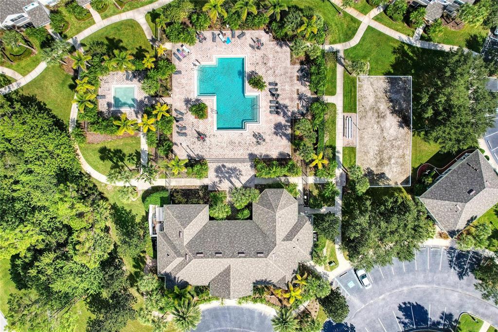 8911 Manor Loop, Unit 207 Lakewood Ranch, FL 34202 - Photo 56 of 71 an aerial view of a house with a yard and a garden