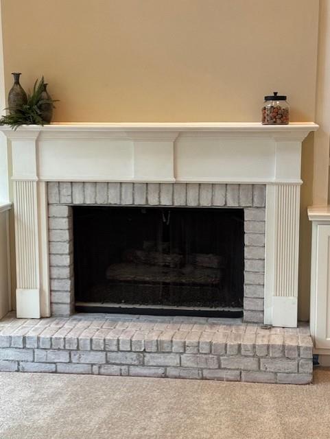 4055 Vista Point Lane Suwanee, GA 30024 - Photo 12 of 39 a fireplace with a fireplace in front of it