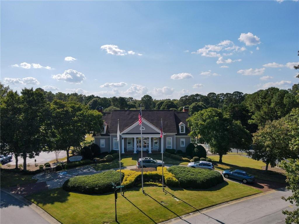 4055 Vista Point Lane Suwanee, GA 30024 - Photo 35 of 39 a view of a house with swimming pool and sitting area