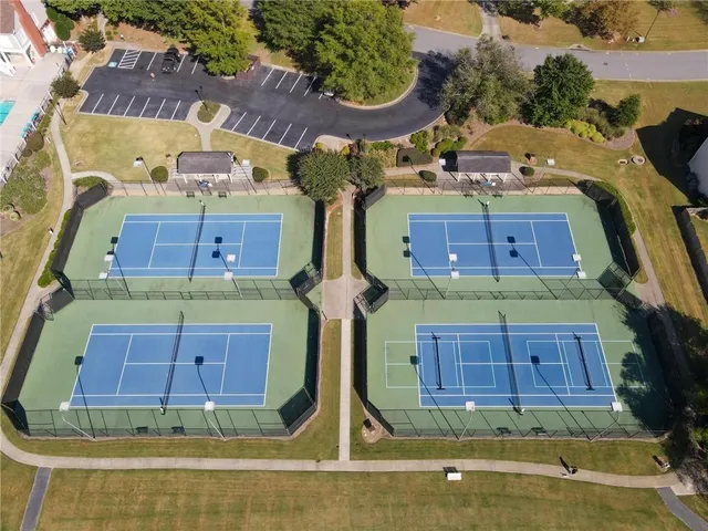 an aerial view of a tennis court