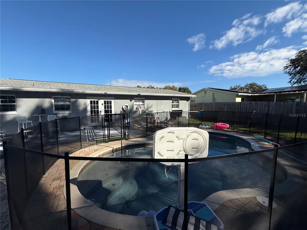 3066 19th Place Southwest Largo, FL 33774 - Photo 2 of 18 a view of a roof deck with furniture