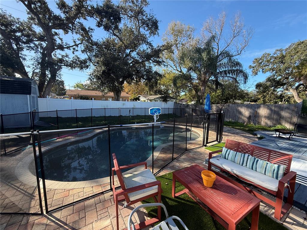 3066 19th Place Southwest Largo, FL 33774 - Photo 4 of 18 a outdoor view with a sitting space