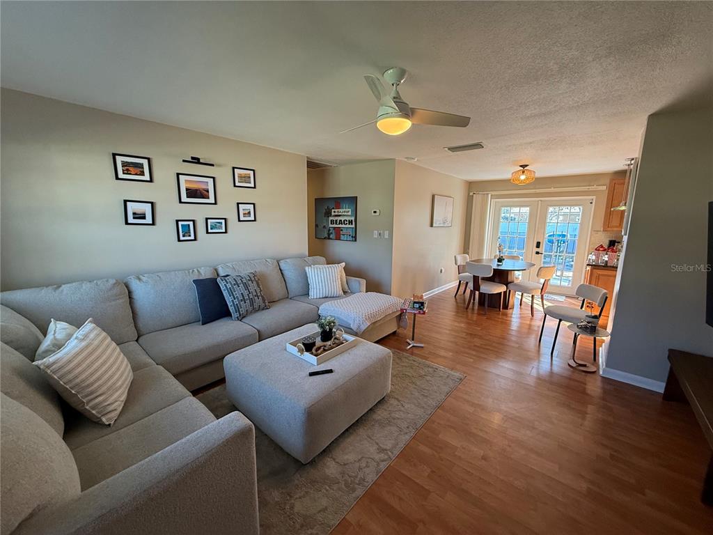 3066 19th Place Southwest Largo, FL 33774 - Photo 6 of 18 a living room with furniture and wooden floor