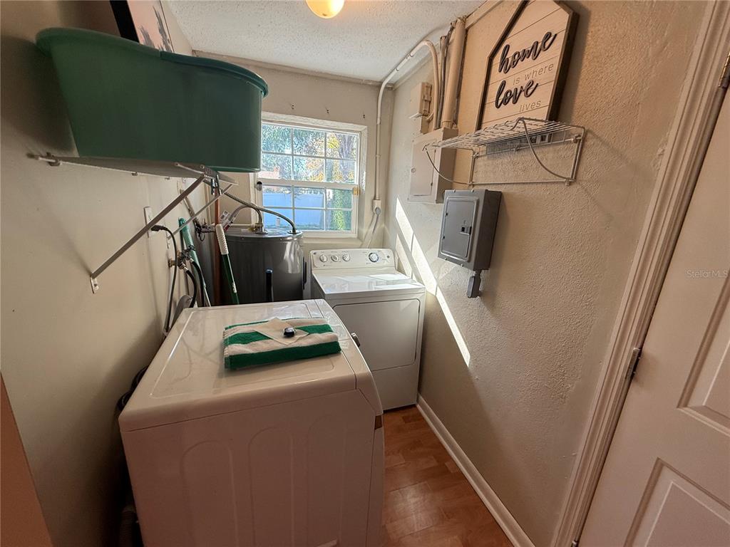 3066 19th Place Southwest Largo, FL 33774 - Photo 10 of 18 a utility room with dryer and washer