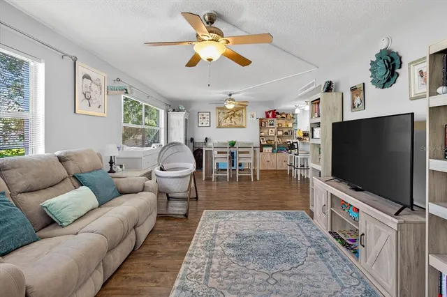 a bedroom with two beds and a window