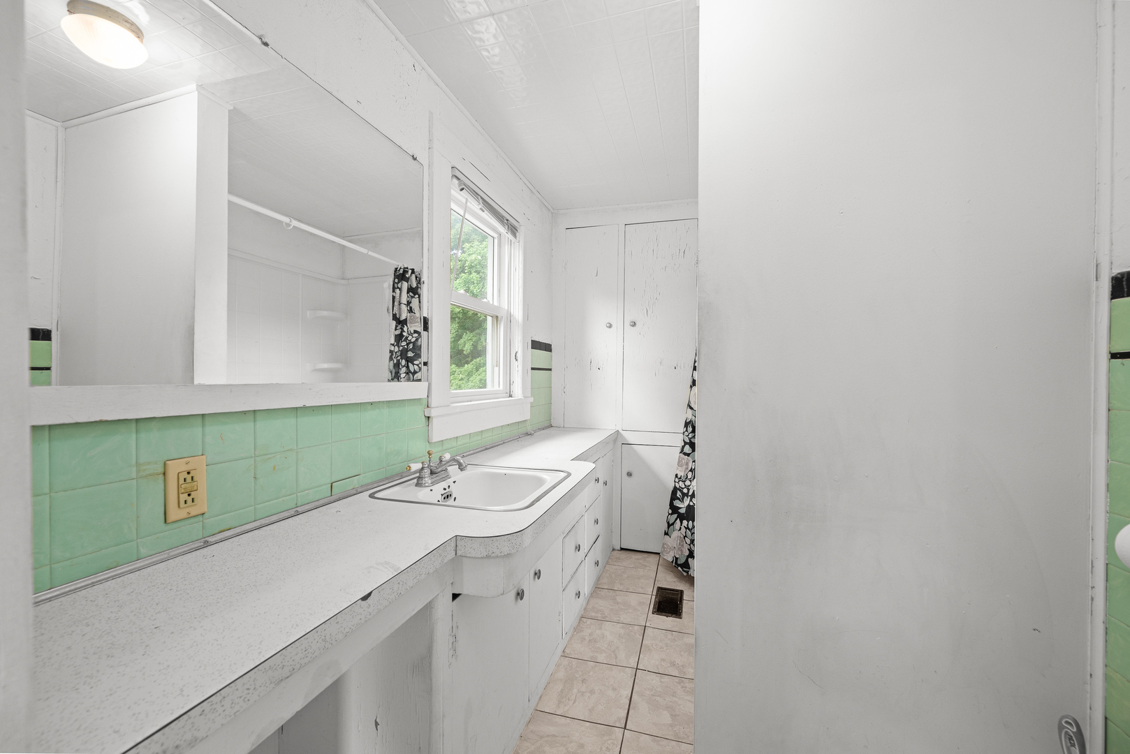 802 North High Street Port Byron, IL 61275 - Photo 38 of 43 a bathroom with a sink a toilet and mirror