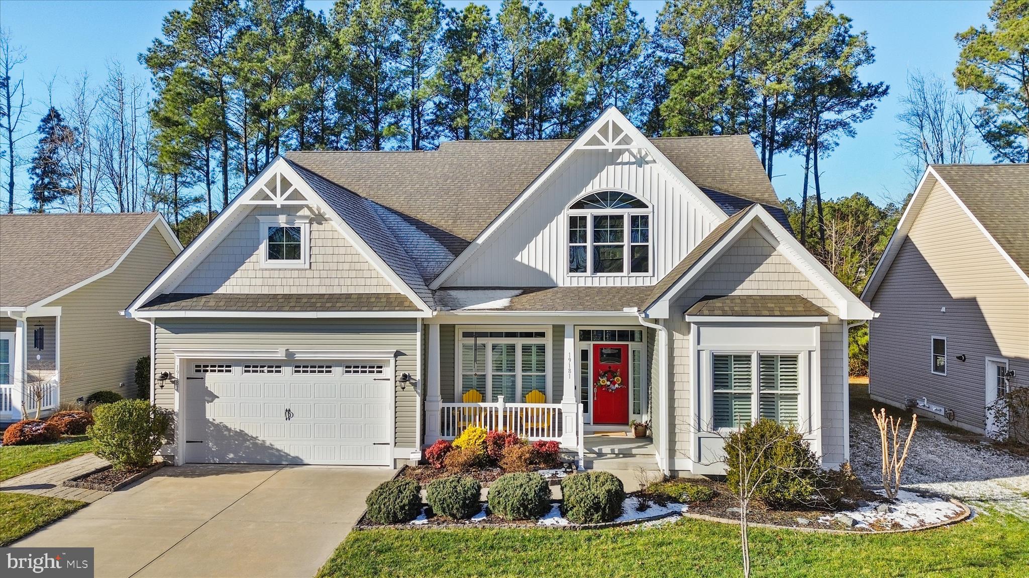 19181 Alcott Way Georgetown, DE 19947 - Photo 1 of 41 a front view of a house with garden