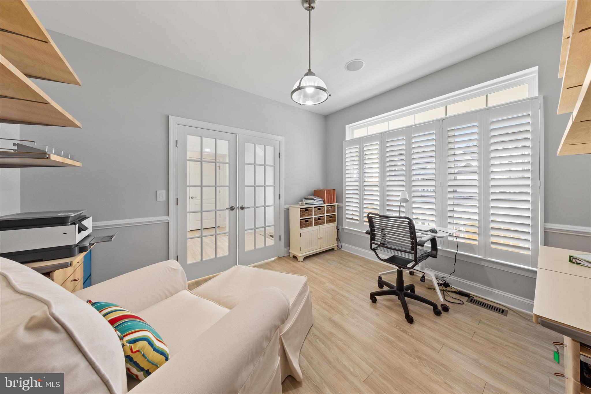 19181 Alcott Way Georgetown, DE 19947 - Photo 23 of 41 a bedroom that has a bed and a chair in it
