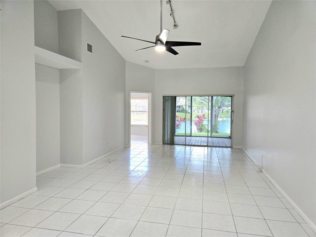 5912 Northwest 93rd Terrace Tamarac, FL 33321 - Photo 5 of 29 a view of an empty room with a window